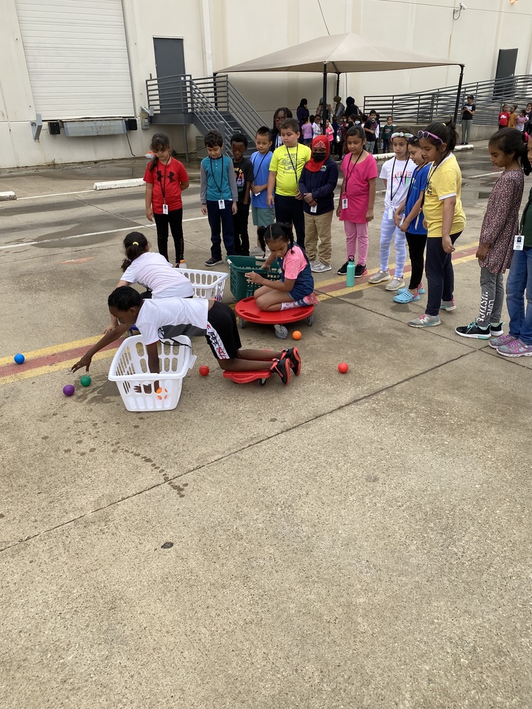 Students outdoors participating in field day activities