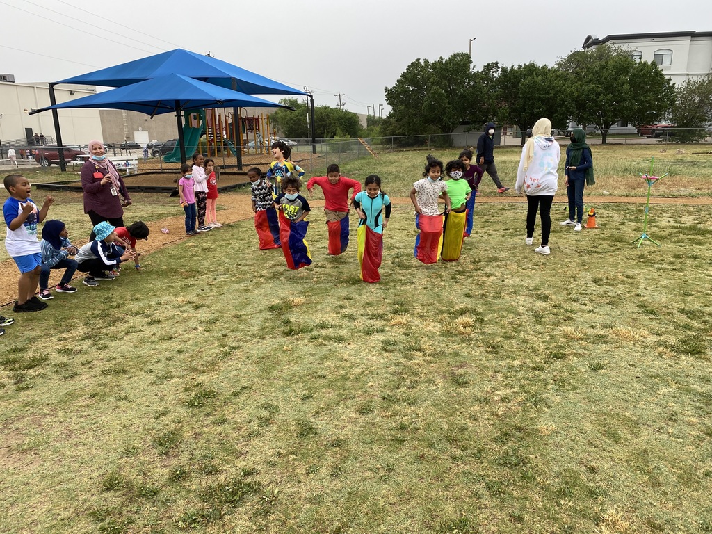 Students outdoors participating in field day activities