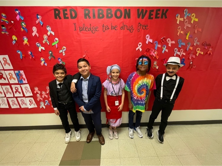 students posing for red ribbon week