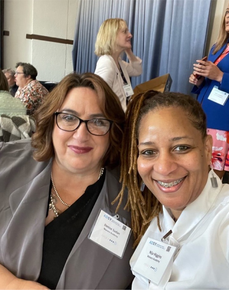 two smiling women