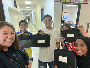 students with Chromebooks